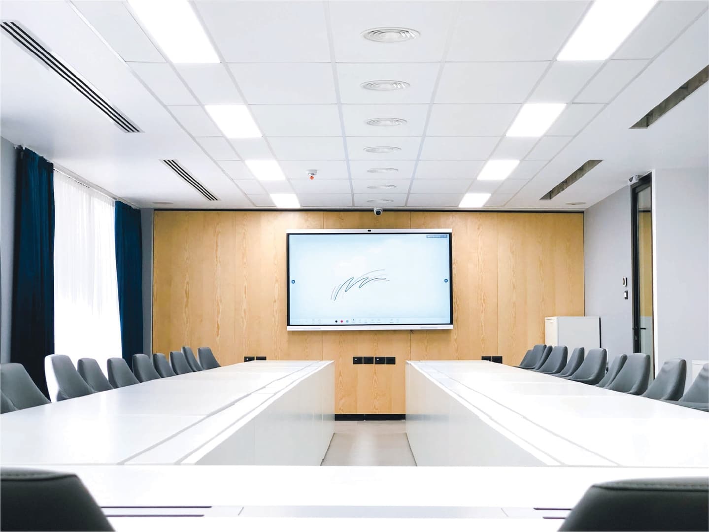 Board Room - full U-shaped table with interactive display