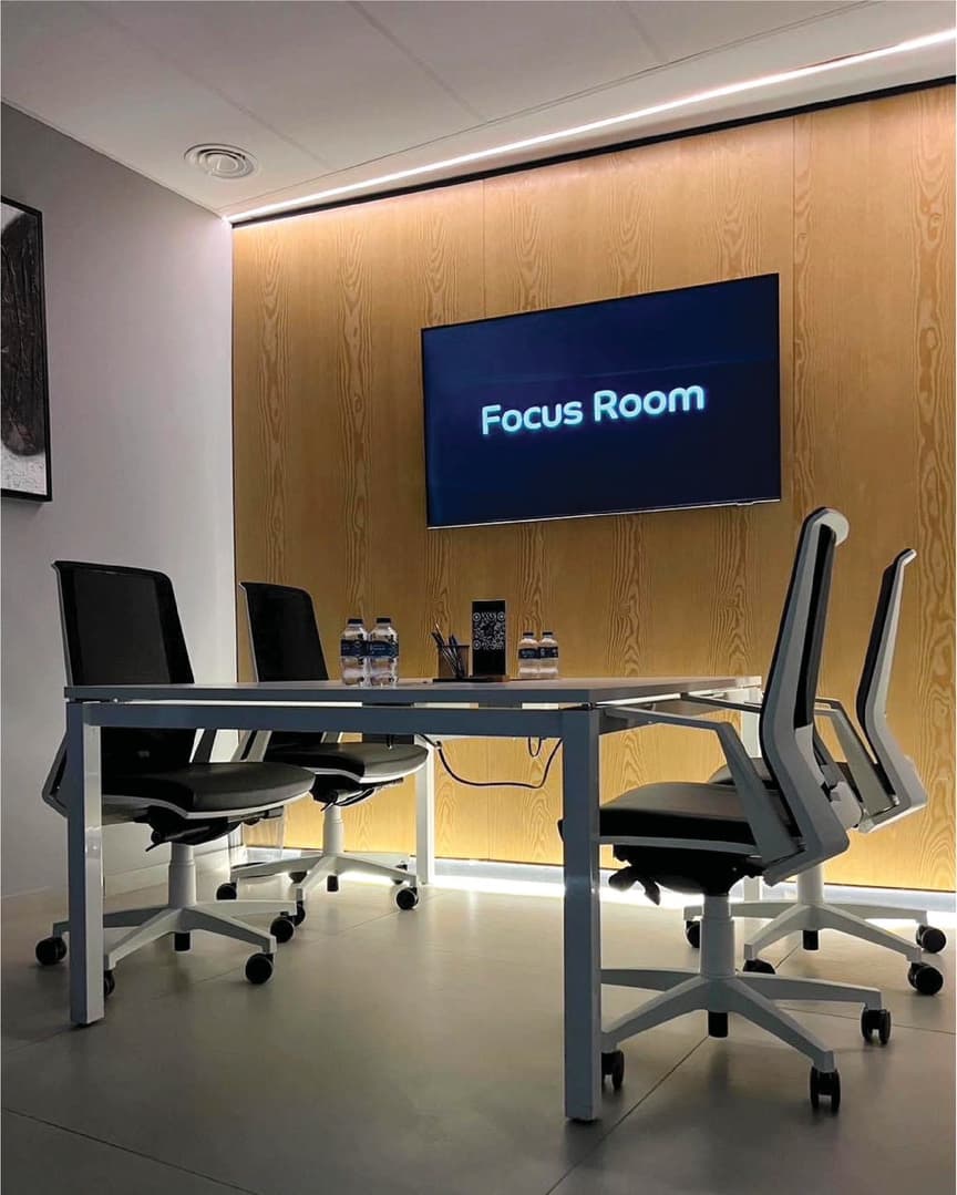Focus Room - side view with Focus Room title on display and warm LED backlighting