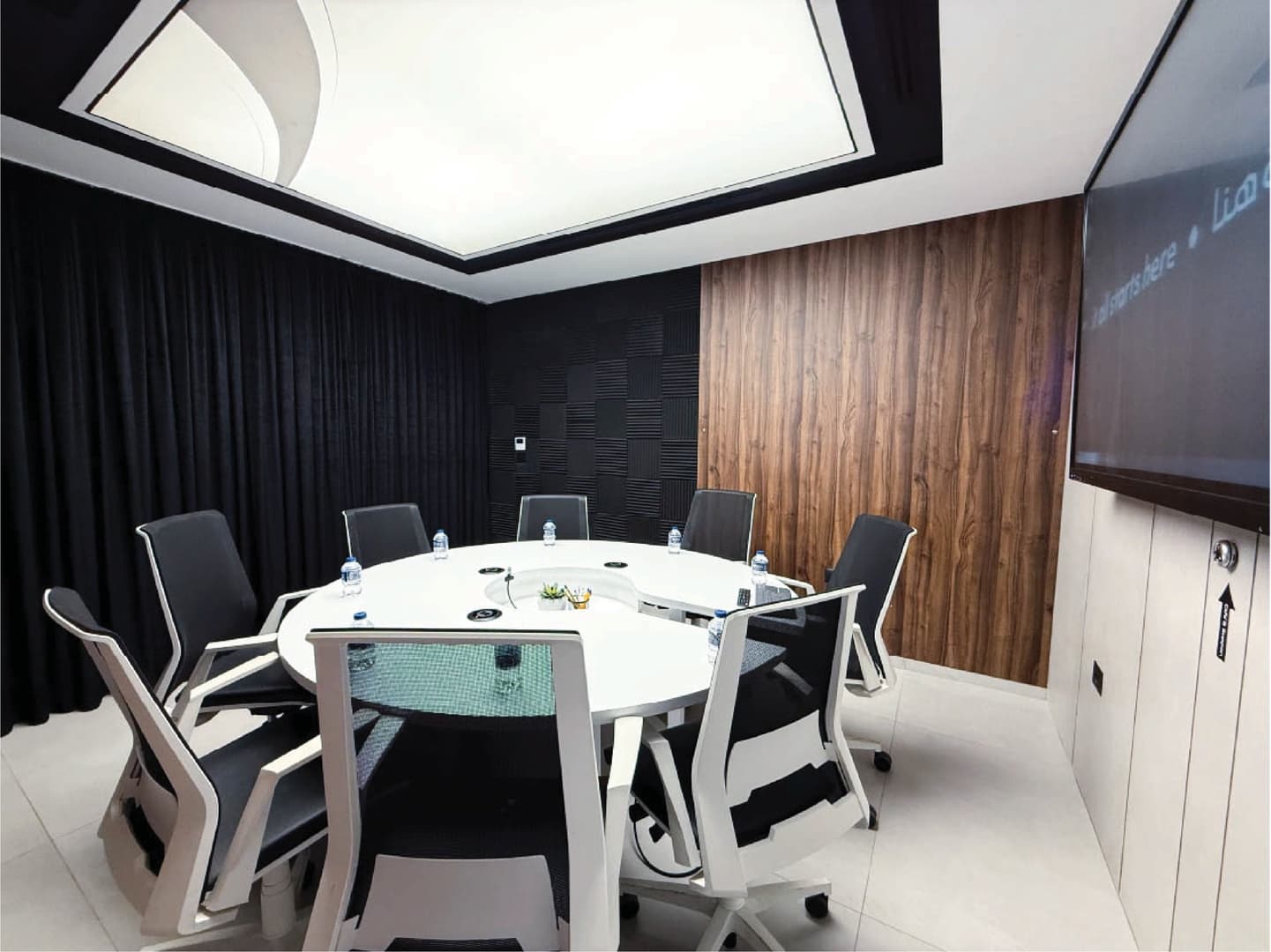 Round Room - full view with diamond ceiling light, dark curtains and acoustic panels