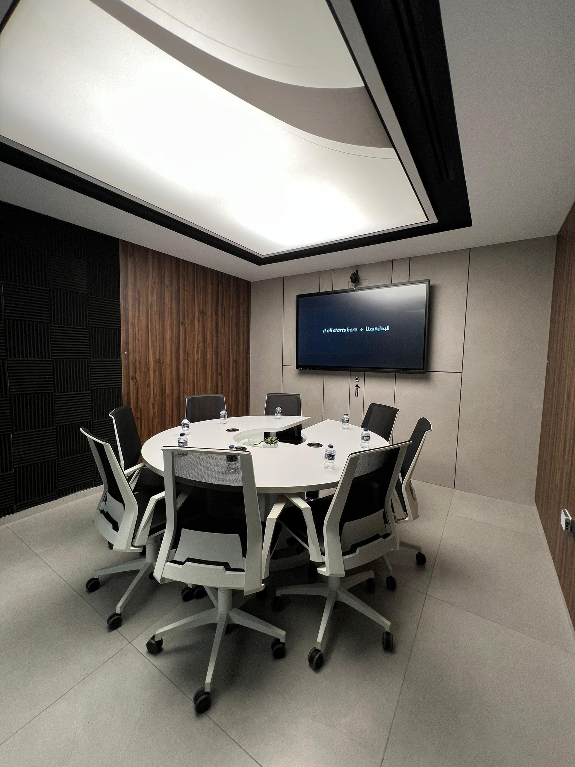 Podcast room with unique curved ceiling and acoustic design